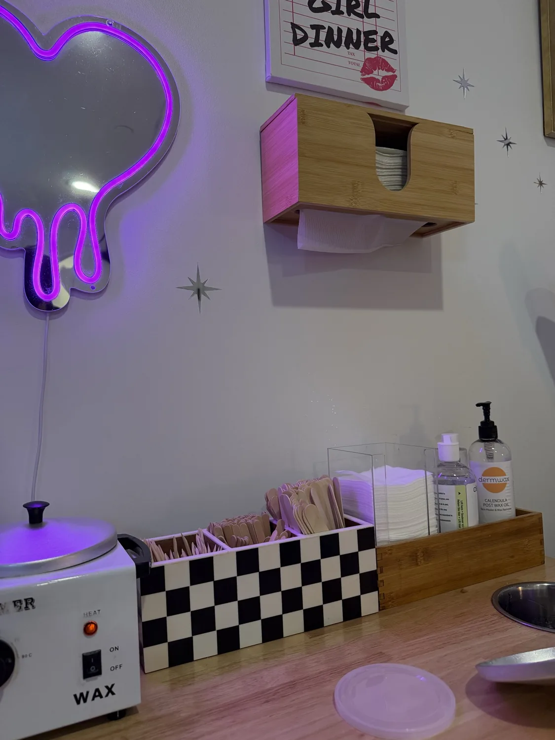 Clean, single-use waxing supplies organized by the wax warmer